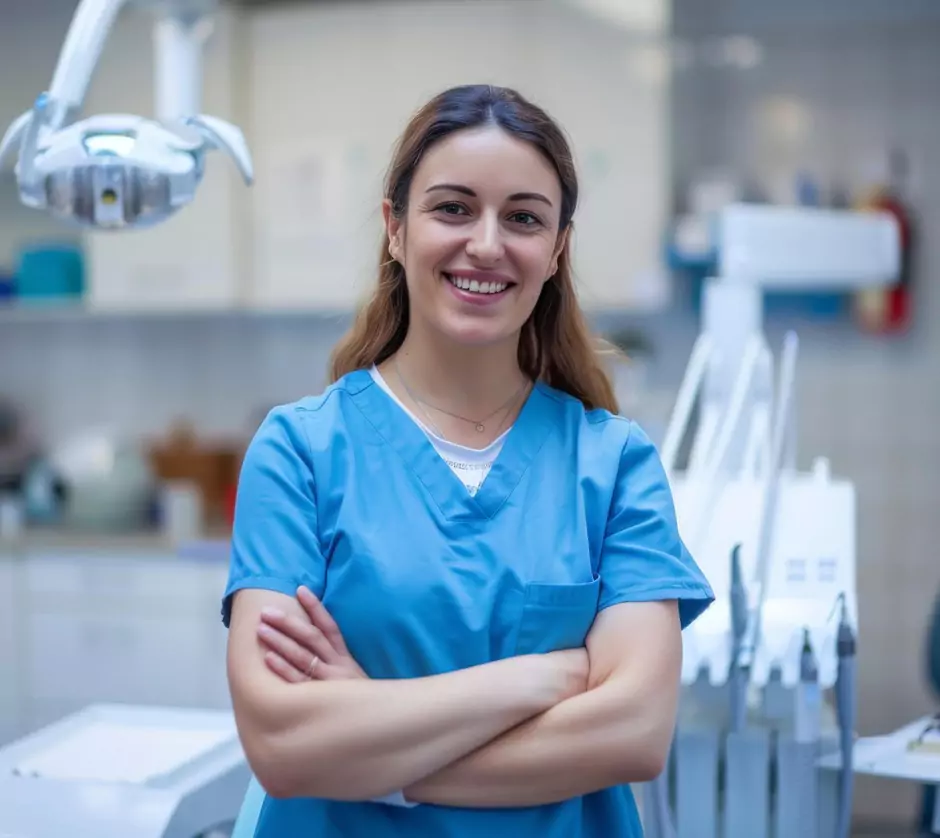 Smiling dentist in clinic